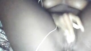 Ebony babe plays with pussy