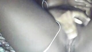 Ebony babe plays with pussy