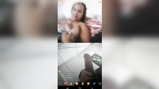 brunette brazilian girl showing her brown breasts