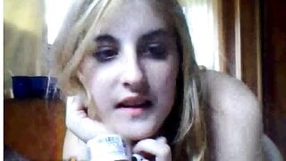 Blonde girl showing and masturbating