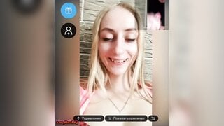 Busty girl's reaction to self-sucking