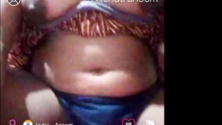 Indian - Assam girl shows her boobs and plays with her pussy