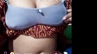 Indian - Assam girl shows her boobs and plays with her pussy