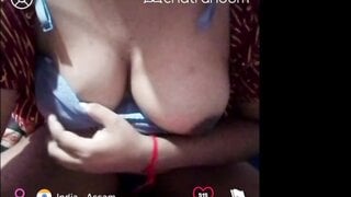 Indian - Assam girl shows her boobs and plays with her pussy