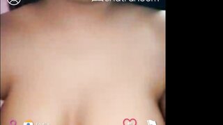 Indian - Sexy girl plays with her boobs and pussy.