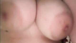 American girl plays with huge tits and shows pussy