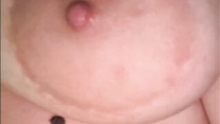 American girl plays with huge tits and shows pussy