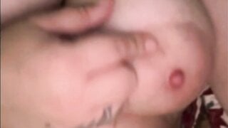 American girl plays with huge tits and shows pussy
