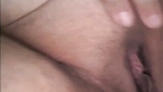 American girl plays with huge tits and shows pussy