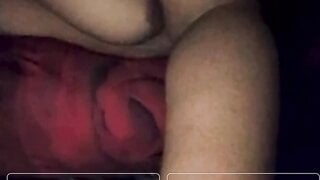 Sitting on Ome.tv with her tits out