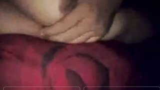 Sitting on Ome.tv with her tits out