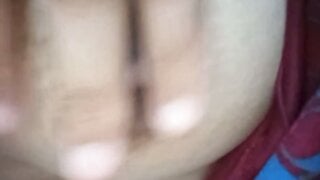 Indonesian BBW takes her tits out