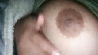 Indonesian takes her boob out