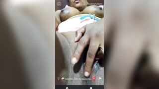 Beautiful Colombian girl is fingering her juicy pussy