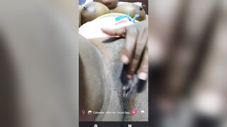 Beautiful Colombian girl is fingering her juicy pussy
