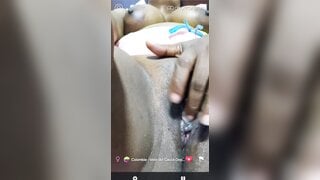 Beautiful Colombian girl is fingering her juicy pussy