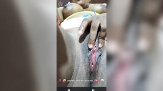 Beautiful Colombian girl is fingering her juicy pussy