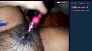 Hairy Indian girl squirts on curling iron on flingster