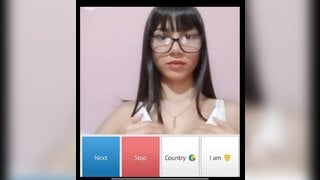 Beautiful glsses girl playing with her boobs