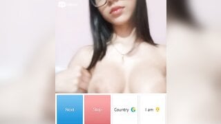 Beautiful glsses girl playing with her boobs