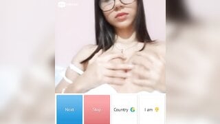 Beautiful glsses girl playing with her boobs