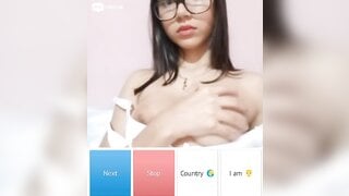 Beautiful glsses girl playing with her boobs