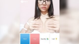 Beautiful glsses girl playing with her boobs
