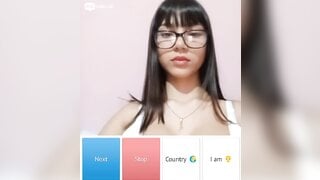 Beautiful glsses girl playing with her boobs