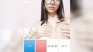 Beautiful glsses girl playing with her boobs