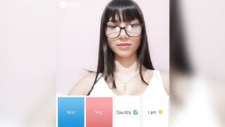 Beautiful glsses girl playing with her boobs