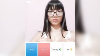 Beautiful glsses girl playing with her boobs