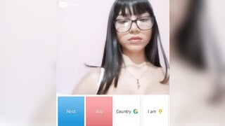 Beautiful glsses girl playing with her boobs
