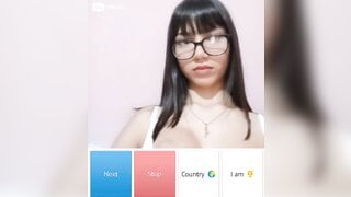 Beautiful glsses girl playing with her boobs