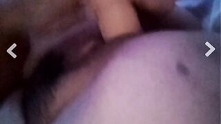 A Colombian woman sucking and inserting a dildo