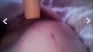 A Colombian woman sucking and inserting a dildo