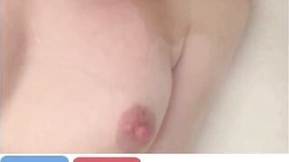 Blonde Russian babe showing tits and ass in bath, pt. 1 & 2