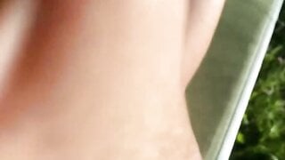 Italian Milf sunbathing shows Tits and Pussy