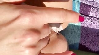 Italian Milf sunbathing shows Tits and Pussy